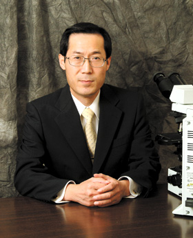 写真:代表取締役社長 上村 弘